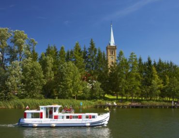Land der tausend Seen: Mit dem Hausboot die Masurische Seenplatte entdecken